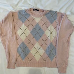 Brandy Melville pink argyle sweater, one size fits all.